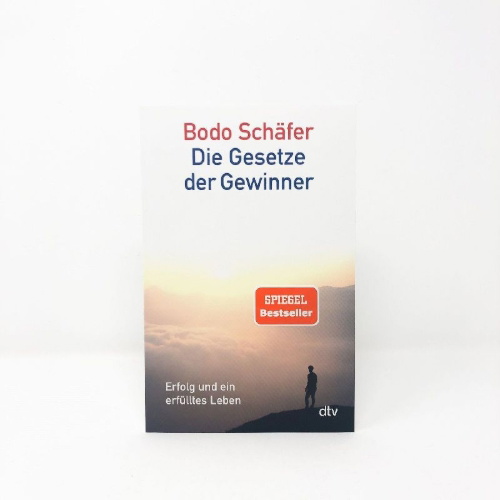 Buchcover und Innenansicht für das Buch: Die Gesetze der Gewinner